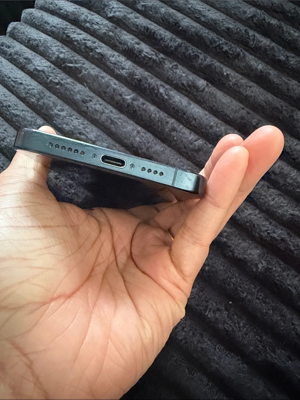 Apple iPhone in Black with Blue-Green Display Accent